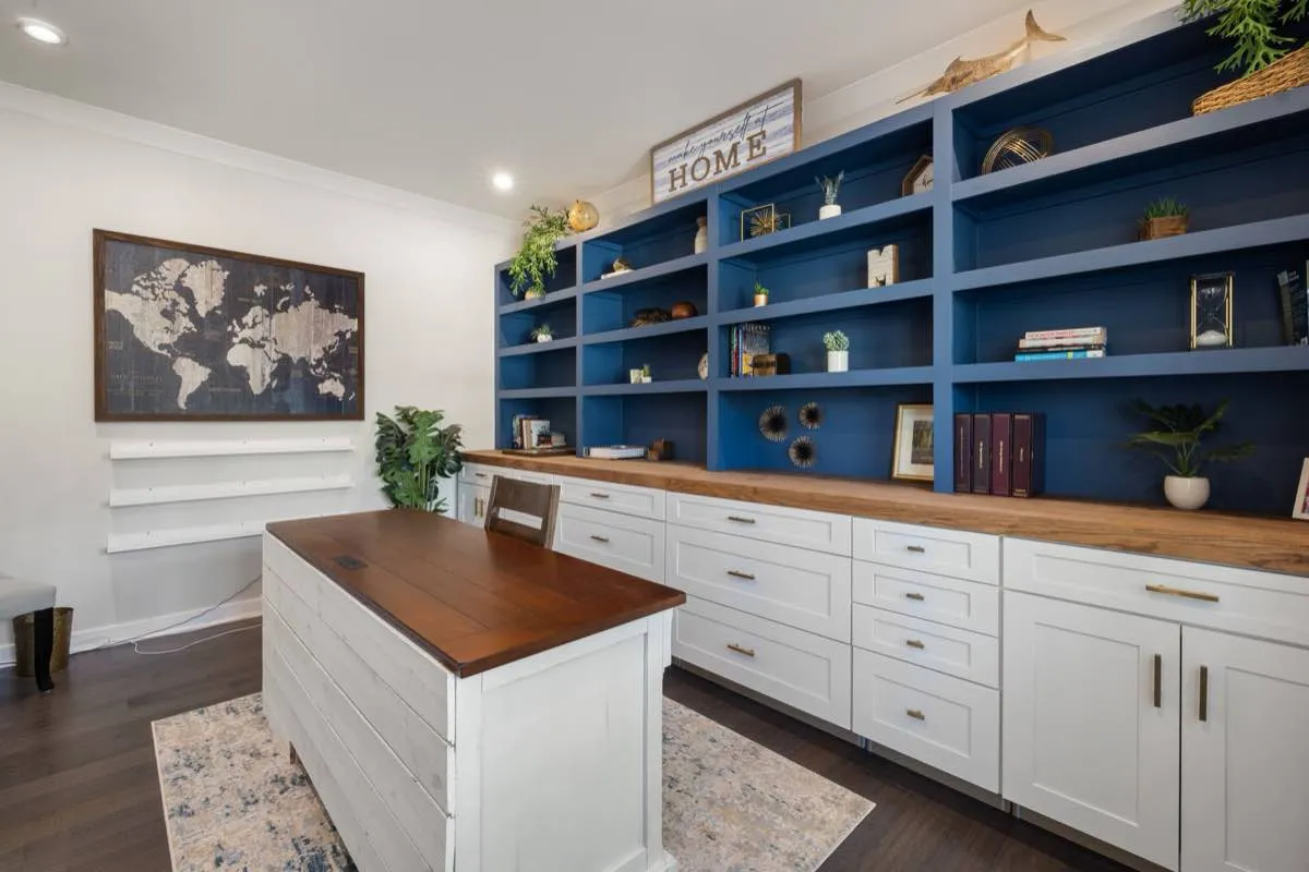 Painted white and stained wood cabinet doors compared in a Oxnard, CA kitchen
